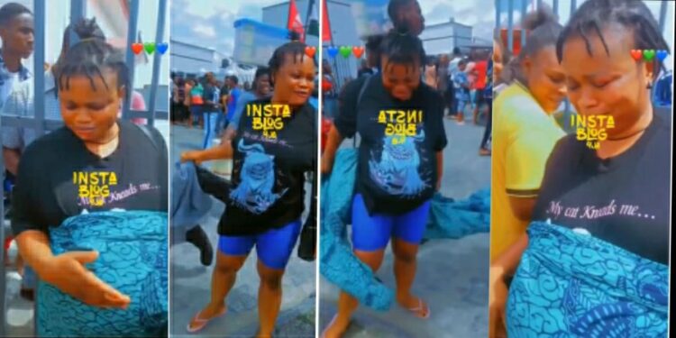 Naira Scarcity: lady uses fake pregnancy to jump queue at bank (VIDEO)