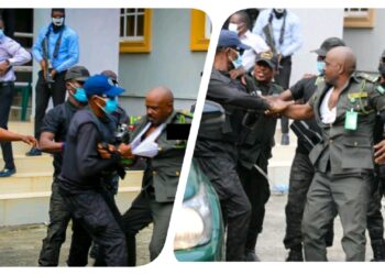 Watch moment DSS operative beats prison official during scuffle over Emefiele’s custody (VIDEO)