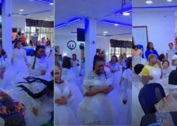 Single women spotted wearing wedding gowns in church to pray for husbands, netizens react (VIDEO)