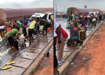 Moment Lagosians r!sk their l!ves to scoop fuel from fallen tanker (VIDEO)