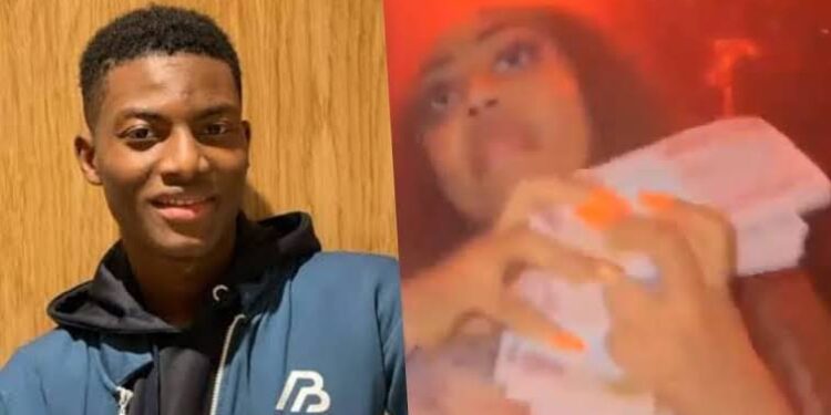Son of DSS DG seen spraying wraps of Naira on a Regina Daniels at a night club (VIDEO)